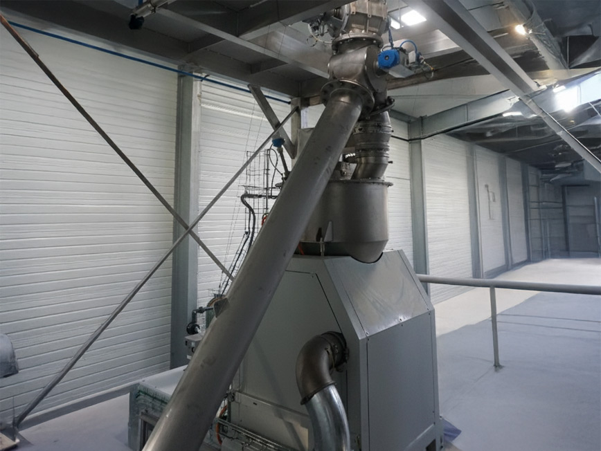 Feeding a Halpaq bagging machine